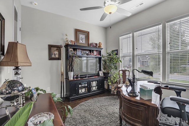 office area featuring dark wood-type flooring and ceiling fan