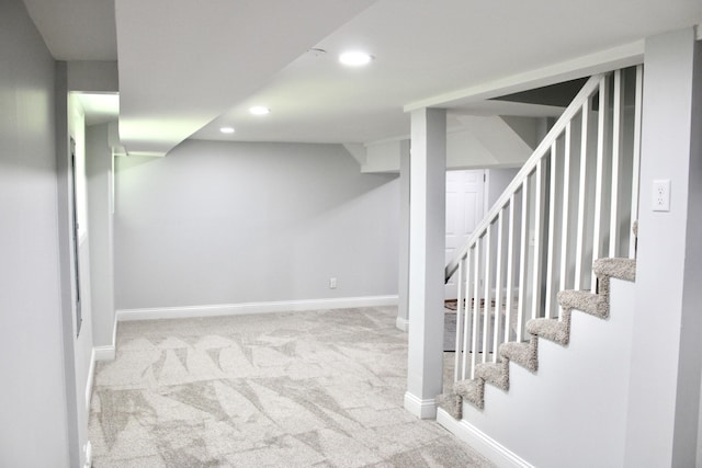 basement with light carpet