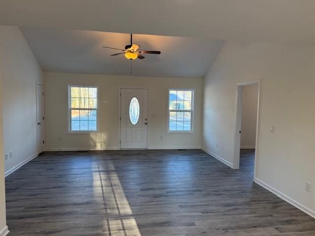 entryway featuring dark hardwood / wood-style flooring, vaulted ceiling, and ceiling fan