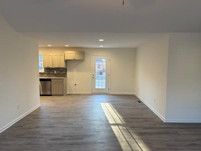 unfurnished living room with dark hardwood / wood-style floors