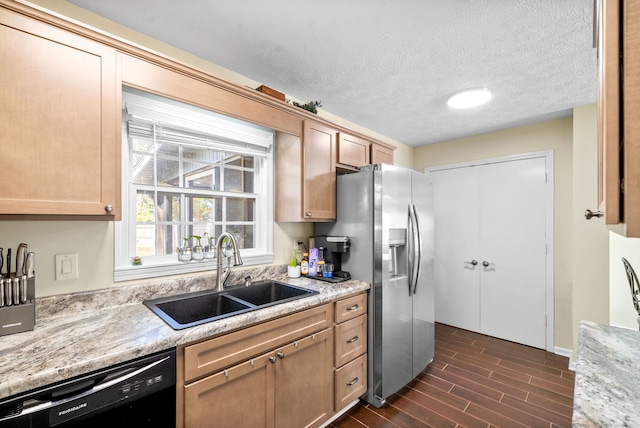 kitchen featuring black dishwasher, a textured ceiling, dark wood-type flooring, stainless steel refrigerator with ice dispenser, and sink