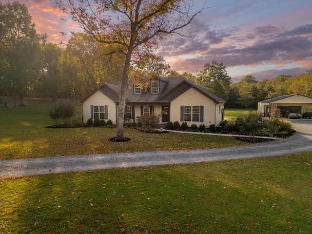 view of front of home with a lawn