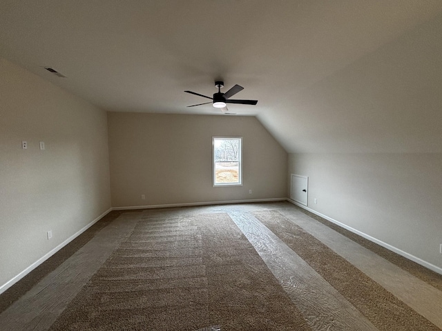 bonus room featuring lofted ceiling and ceiling fan