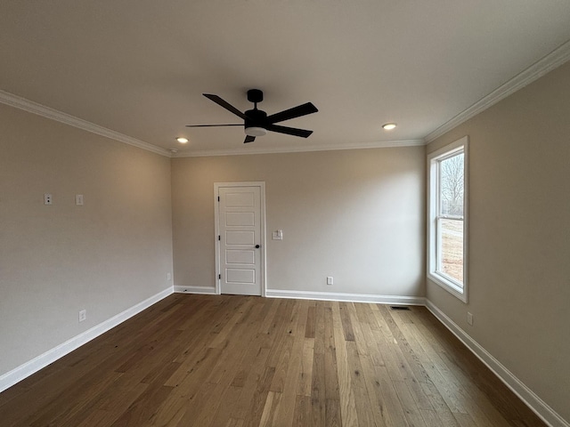 unfurnished room featuring crown molding, hardwood / wood-style flooring, and ceiling fan