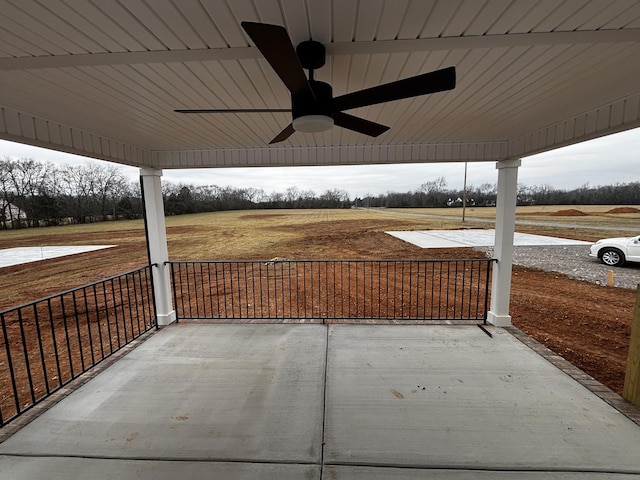 view of patio featuring ceiling fan