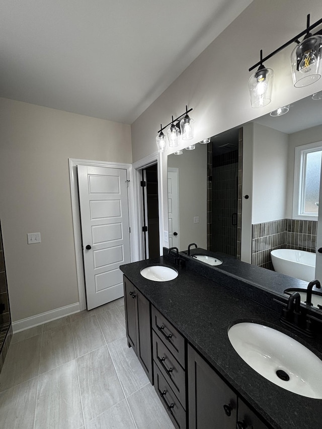 bathroom featuring vanity and plus walk in shower