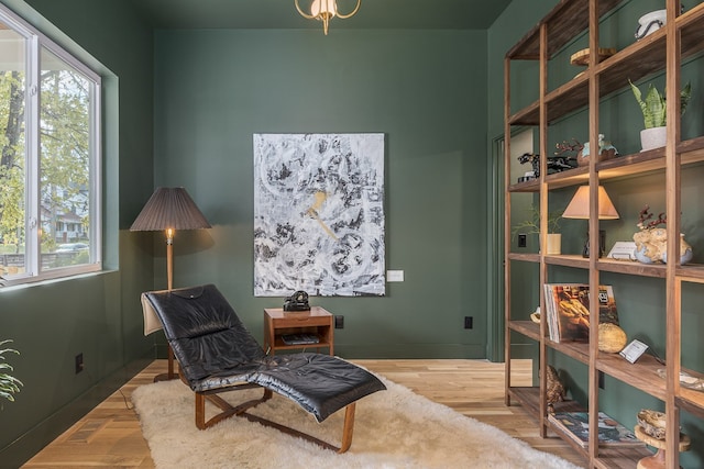 living area with light hardwood / wood-style floors