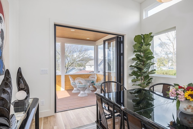 doorway to outside with light hardwood / wood-style flooring