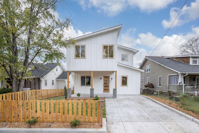 modern farmhouse featuring covered porch