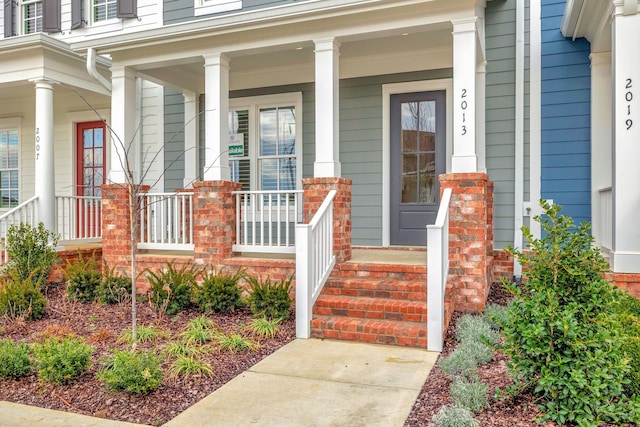 doorway to property with covered porch