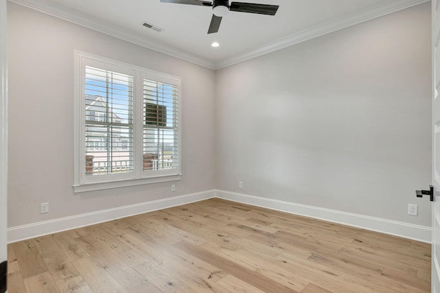 spare room featuring ornamental molding, ceiling fan, and light hardwood / wood-style floors