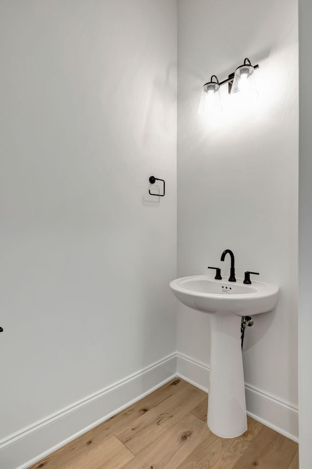 bathroom featuring wood-type flooring