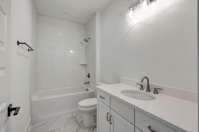 full bathroom featuring vanity, toilet, and tiled shower / bath combo