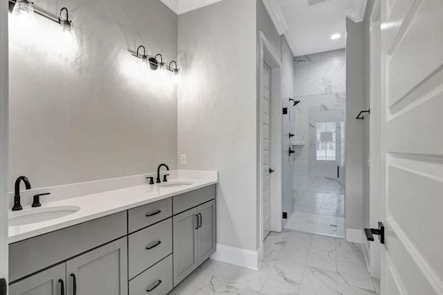 bathroom with vanity, an enclosed shower, and crown molding