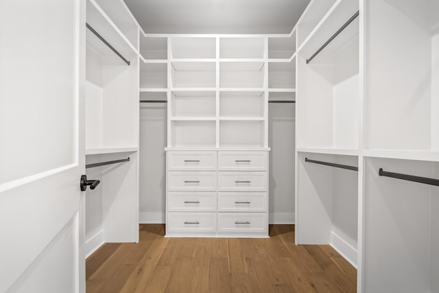 walk in closet featuring light wood-type flooring