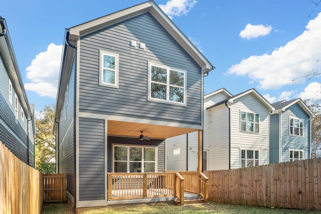 back of house with ceiling fan