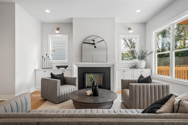 living room with light hardwood / wood-style flooring