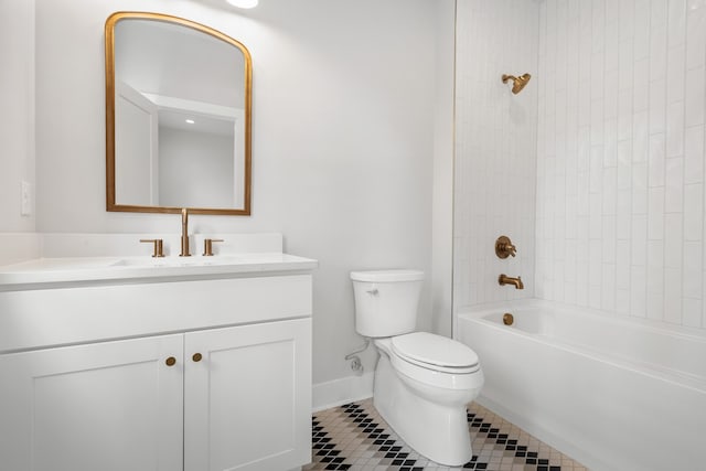 full bathroom featuring toilet, tiled shower / bath, vanity, and tile patterned floors