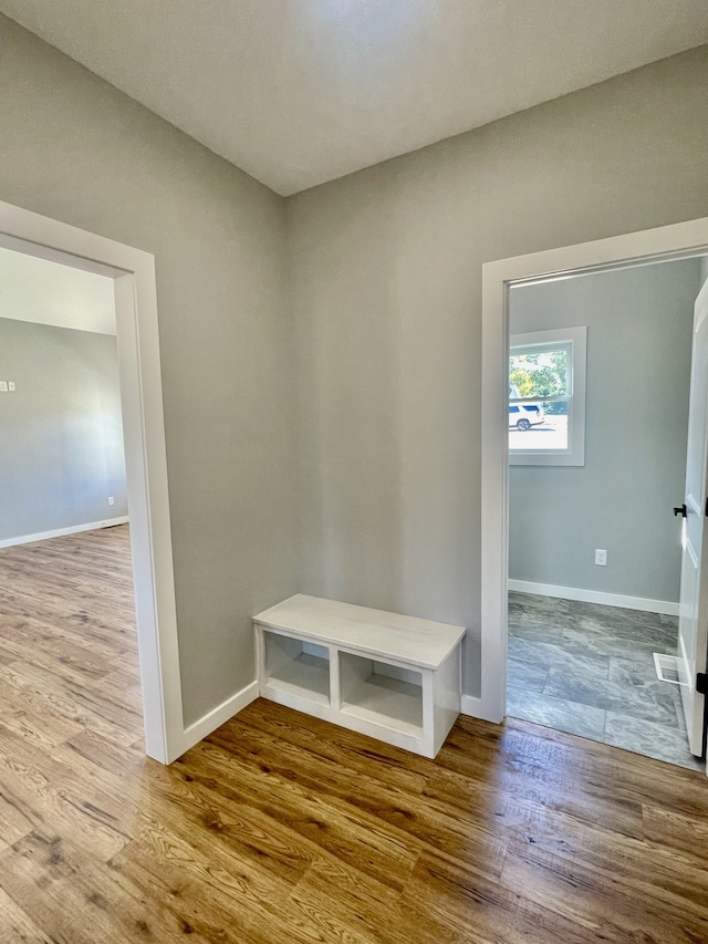 mudroom with hardwood / wood-style flooring