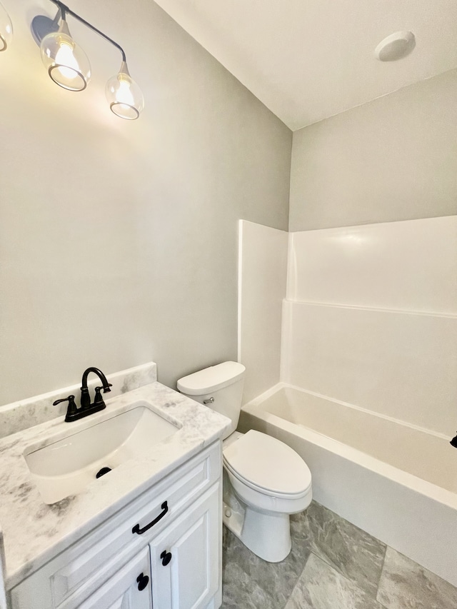 full bathroom featuring vanity, toilet, and shower / bathtub combination