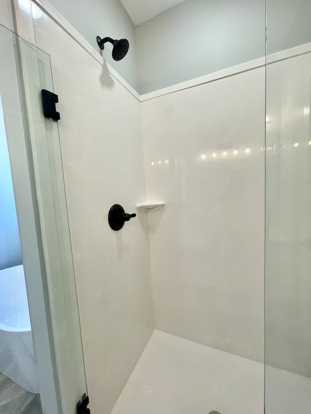 bathroom with a shower