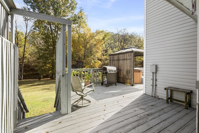 wooden deck featuring grilling area