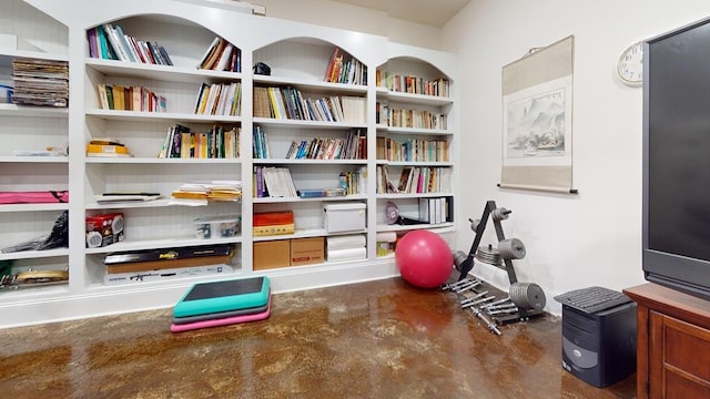 exercise area with concrete floors