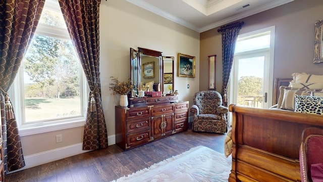 bedroom with crown molding and dark hardwood / wood-style flooring