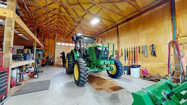 garage with a workshop area