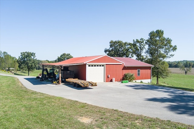 view of property exterior featuring a garage, a lawn, and a carport