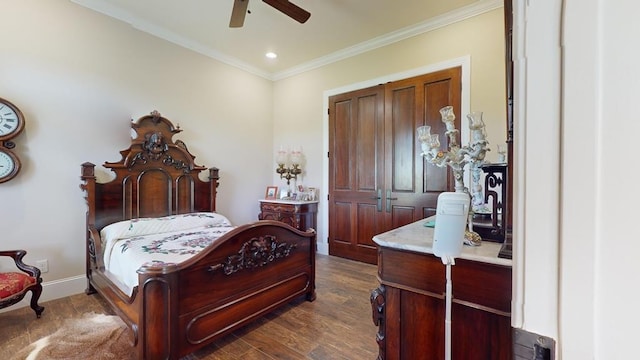 bedroom featuring dark hardwood / wood-style flooring, ornamental molding, and ceiling fan