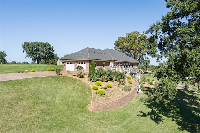 view of yard with a garage