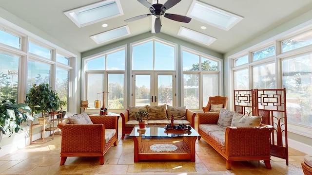 sunroom / solarium featuring french doors, a healthy amount of sunlight, ceiling fan, and vaulted ceiling