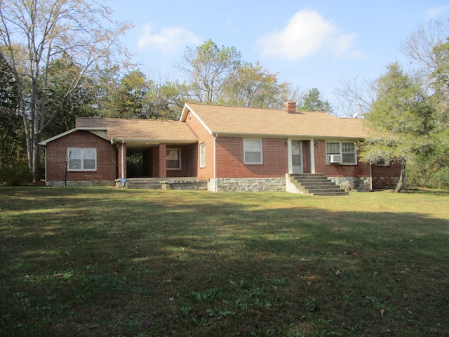 single story home with cooling unit and a front lawn