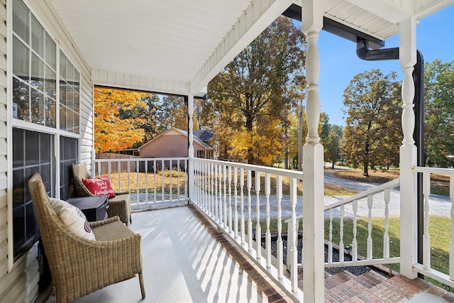 balcony featuring covered porch