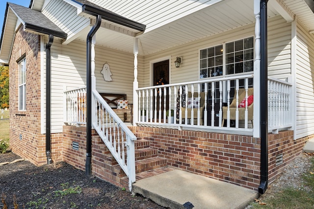 entrance to property with covered porch