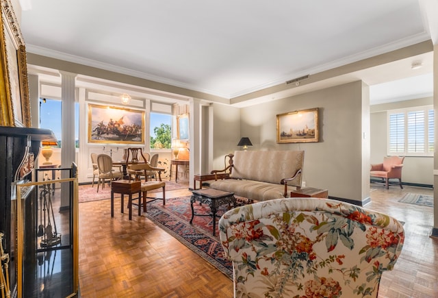 living room with parquet flooring, crown molding, and plenty of natural light