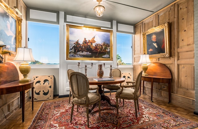 sitting room featuring parquet floors