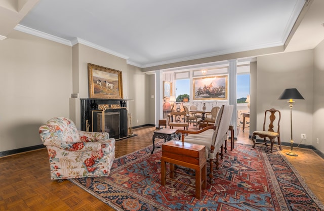 living room with ornamental molding and dark parquet flooring