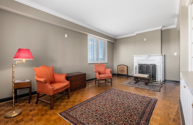 sitting room featuring ornamental molding and dark parquet flooring