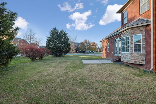 view of yard with a patio area