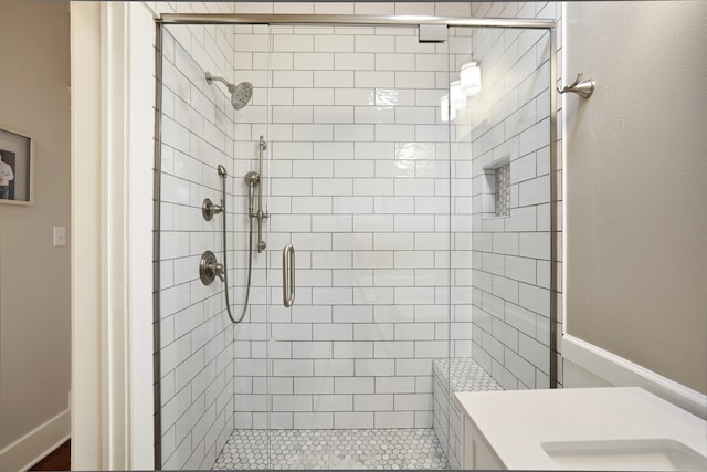 bathroom featuring vanity and walk in shower