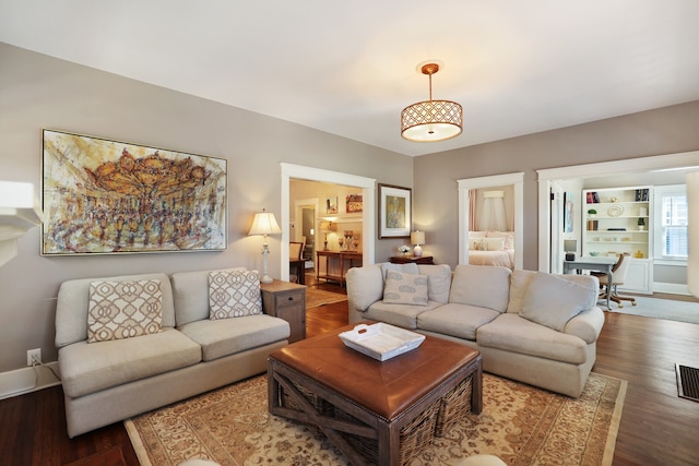 living room with wood-type flooring