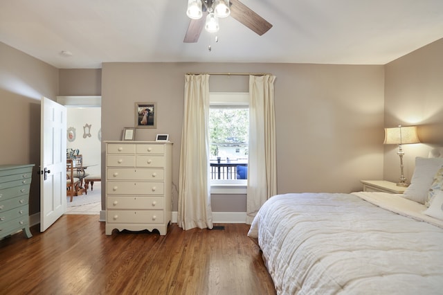 bedroom featuring dark wood-type flooring and ceiling fan