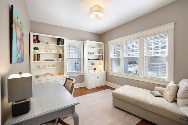 office area with light hardwood / wood-style floors