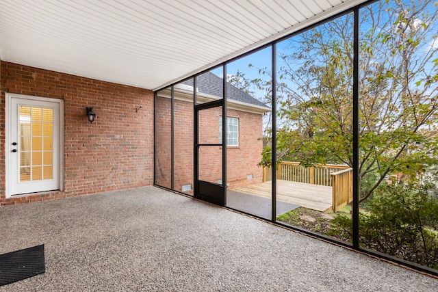 unfurnished sunroom with a healthy amount of sunlight