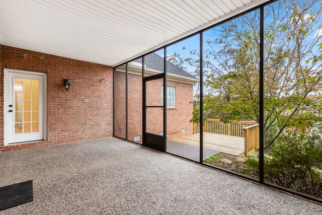 unfurnished sunroom with a healthy amount of sunlight