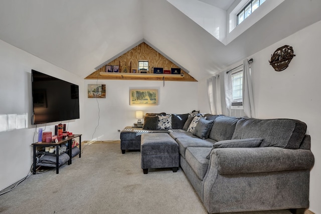 living room featuring light carpet and high vaulted ceiling