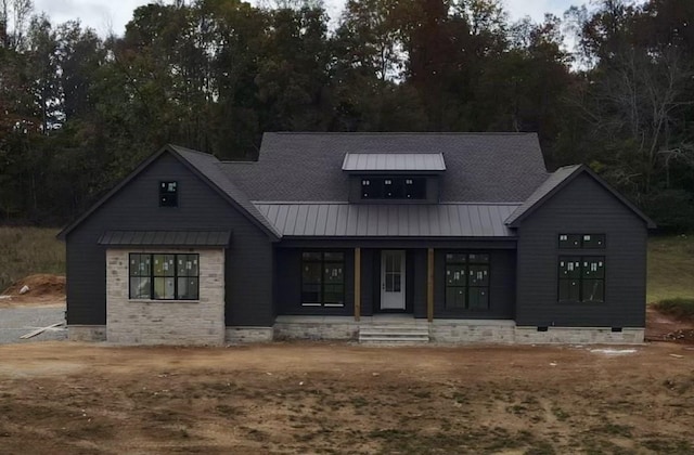 948 Hidden River Rd, Rock Island, TN 38581 - view of front of house featuring a standing seam roof, covered porch, metal roof, and crawl space
