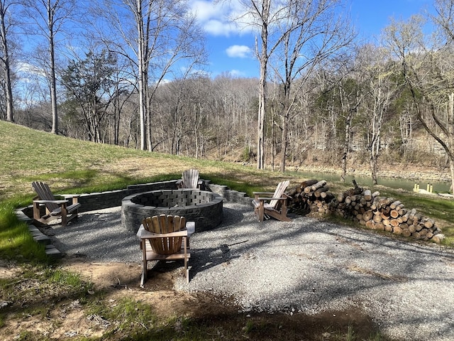 948 Hidden River Rd, Rock Island, TN 38581 - view of patio / terrace featuring a forest view and an outdoor fire pit